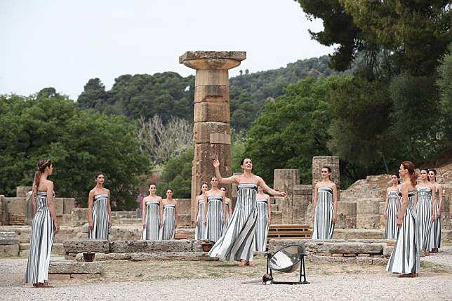 Greek actress Mary Mina ©, in the role of High Priestess, performs during the Olympic flame lighting ceremony for the Paris 2024 Olympic Games in Ancient Olympia, Greece, on April 16, 2024. (Xinhua/Li Jing)