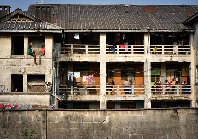 People are seen from a building in Lagos, Nigeria, Feb. 28, 2024. (Xinhua/Han Xu)