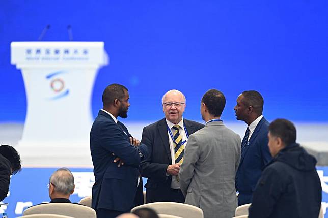 Guests communicate ahead of the opening ceremony of the 2024 World Internet Conference (WIC) Wuzhen Summit in Wuzhen, east China's Zhejiang Province, Nov. 20, 2024. (Xinhua/Huang Zongzhi)