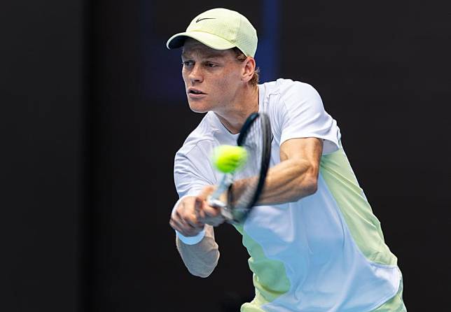 Jannik Sinner hits a return during his Australian Open men's singles fourth round win against Holger Rune in Melbourne, Jan. 20, 2025. (Photo by Hu Jingchen/Xinhua)