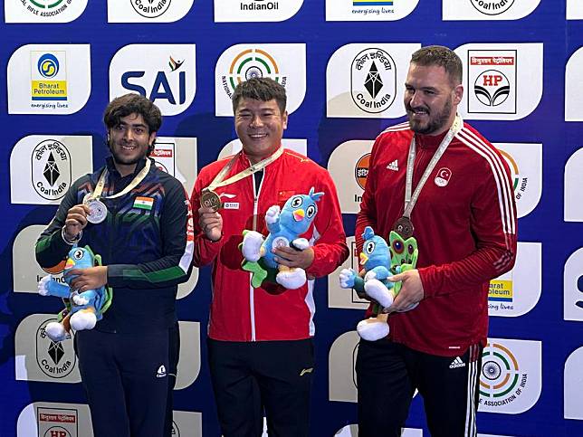 Medalists pose for a photo at the award ceremony of the men's trap at the ISSF World Cup Final in New Delhi, India on Oct. 17, 2024. (Handout via Xinhua)