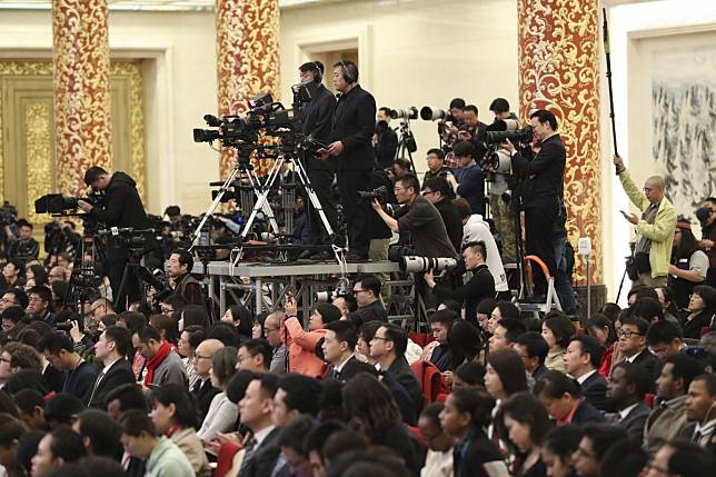 Journalists working in Chinese state media will have to pass the exam to get a press card. Photo: Xinhua