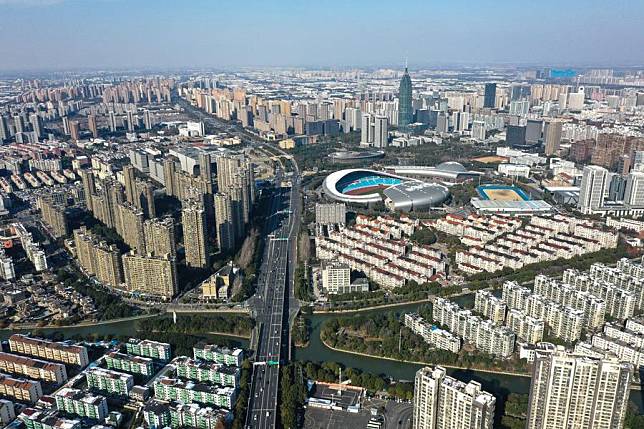 An aerial drone photo taken on Dec. 21, 2023 shows a city view of Changzhou, east China's Jiangsu Province. (Xinhua/Yang Lei)