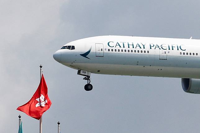 A Cathay Pacific Boeing 777-300ER lands at Hong Kong airport after it reopened following clashes between police and protesters on August 14, 2019. Photo: Reuters