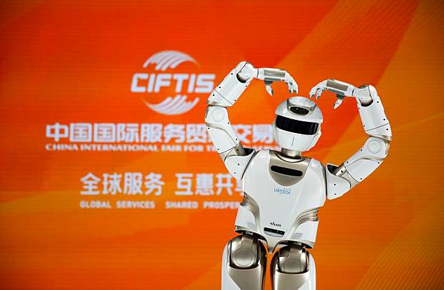 A robot poses during the 2024 China International Fair for Trade in Services (CIFTIS) at the China National Convention Center in Beijing, capital of China, Sept. 12, 2024. Themed &ldquo;Global Services, Shared Prosperity,&rdquo; the 2024 CIFTIS opened at the China National Convention Center and the Shougang Park in Beijing on Thursday. (Xinhua/Zou Guangping)