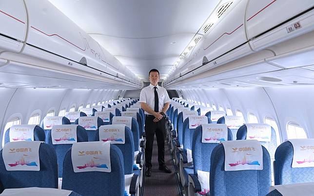 This photo taken on Dec. 13, 2023 shows an interior view of an ARJ21 jetliner at the Hong Kong International Airport in Hong Kong, south China. (Xinhua/Chen Duo)
