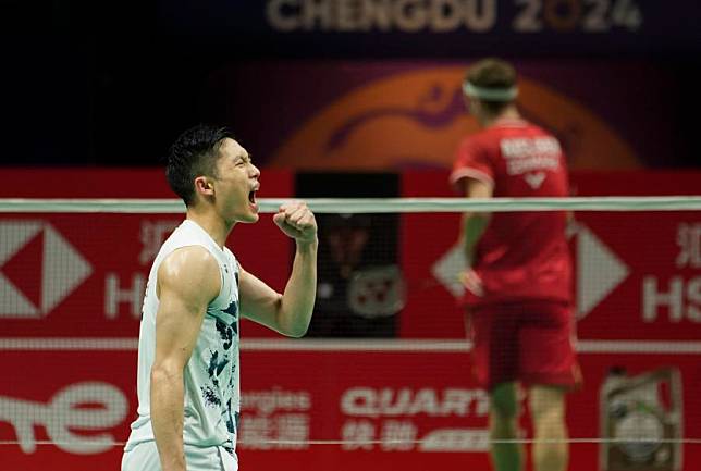 Chou Tien-chen celebrates winning a point against Viktor Axelsen during the quarterfinal between Chinese Taipei and Denmark at the BWF Thomas Cup Finals in Chengdu, southwest China's Sichuan Province, May 3, 2024. (Xinhua/Jiang Hongjing)