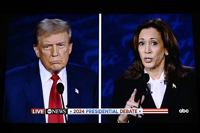 This photo taken at the U.S. presidential debate media filing center on Sept. 10, 2024 shows U.S. Vice President Kamala Harris &reg; and former President Donald Trump during a presidential debate in Philadelphia, the United States. (Xinhua/Li Rui)