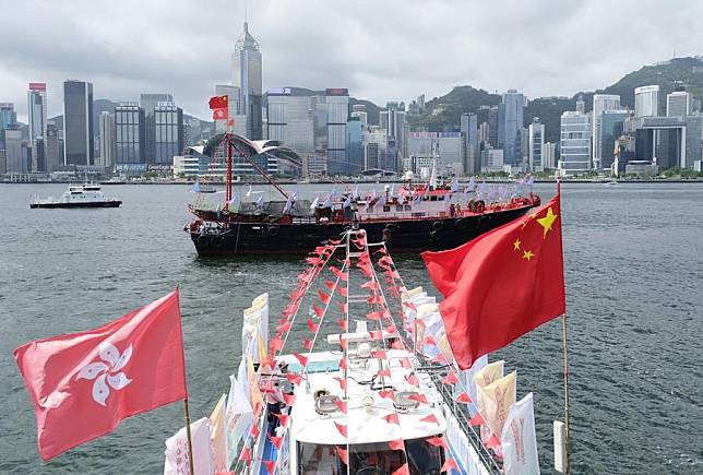 Fishing vessels take part in a cruise held by the Hong Kong Fishermen Consortium to celebrate the 27th anniversary of Hong Kong's return to the motherland at Victoria Harbour in Hong Kong, south China, July 1, 2024. (Xinhua/Wang Shen)