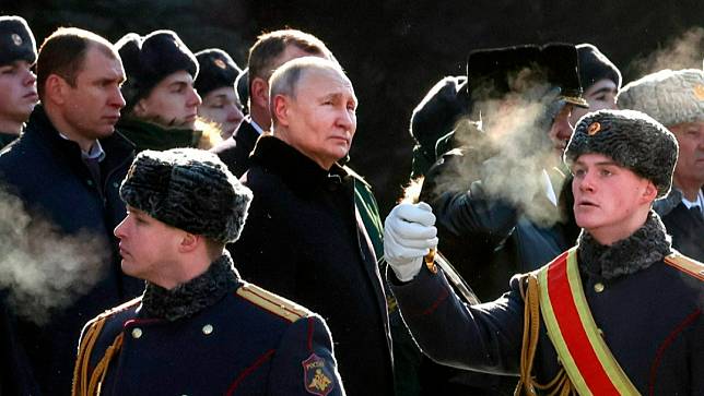 俄羅斯總統普丁參加「祖國保衛者日」紀念活動資料照片。美聯社