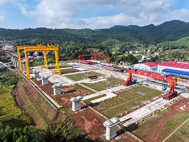 An aerial drone photo taken on Oct. 18, 2024 shows a construction site along the Chongqing-Wanzhou high-speed railway in Xiangshui Town of Wanzhou District of Chongqing, southwest China. (Xinhua/Wang Quanchao)