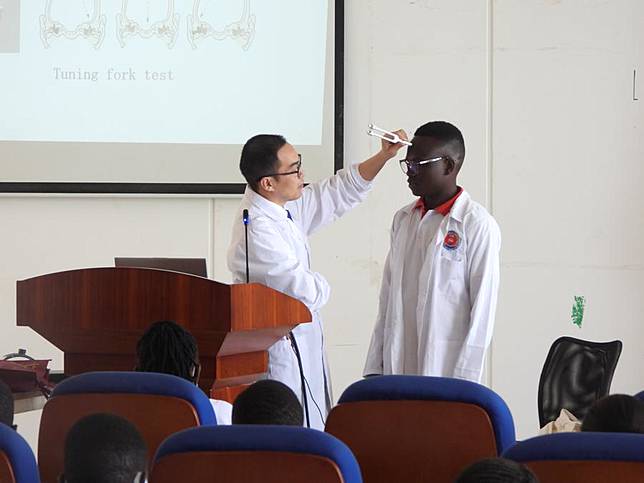 A Chinese doctor demonstrates how to conduct a Rinne test at Juba Teaching Hospital in Juba, capital of South Sudan, March 20, 2025. (Photo by Denis Elamu/Xinhua)