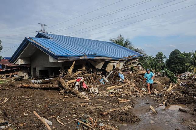 A house is buried in mud and debris after a landslide in Batangas Province, the Philippines, Oct. 25, 2024. (Xinhua/Rouelle Umali)