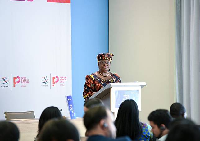 WTO Director-General Ngozi Okonjo-Iweala (at the podium) speaks at the WTO Public Forum 2024 in Geneva, Switzerland, on Sept. 10, 2024. (Xinhua/Lian Yi)