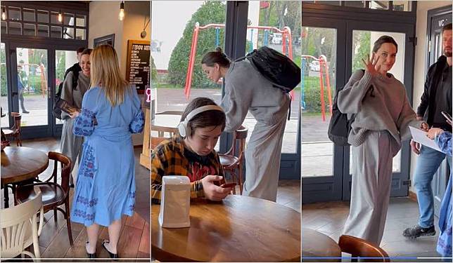 安吉莉娜裘莉出現在烏克蘭利維夫一家咖啡廳，親切為粉絲簽名留念，還向拍攝者揮手致意。(圖擷自Майя Підгородецька臉書)