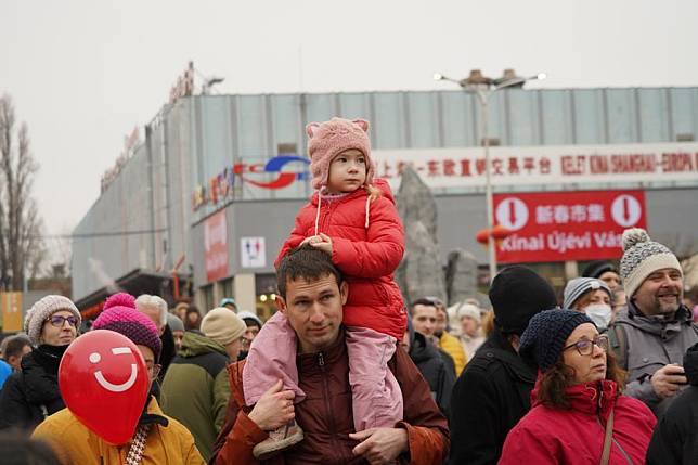 People watch a performance during a temple fair celebrating the upcoming Chinese Lunar New Year in Budapest, Hungary, on Jan. 18, 2025. (Xinhua/Chen Hao)