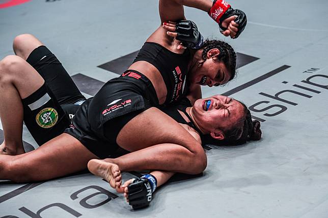 Ritu Phogat delivers some ground and pound to Kim Nam-hee. Photos: One Championship