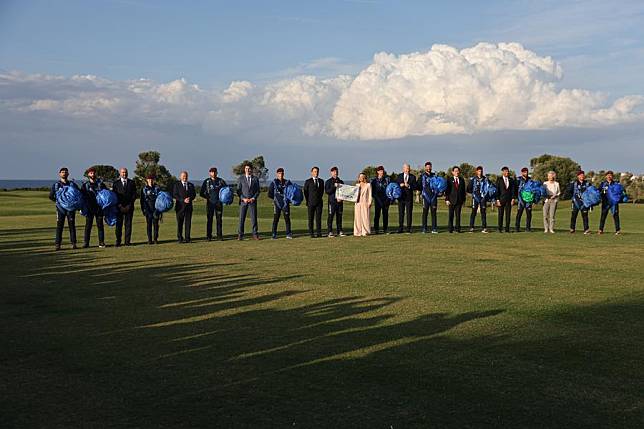 Leaders of the G7 pose for a group photo with the skydiving flag performers at Borgo Egnazia, near the town of Fasano in Apulia Region, Italy, on June 13, 2024. (Xinhua/Li Jing)