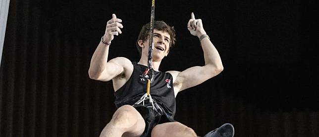 Samuel Watson of the United States celebrates after lowering the men's speed climbing world record at the 2024 IFSC Climbing World Cup in Wujiang, east China's Jiangsu Province, April 12, 2024. (Photo courtesy of IFSC)