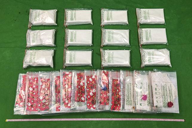 Suspected packets of cocaine found in one of two pieces of luggage seized by customs in Hong Kong. Photo: Handout