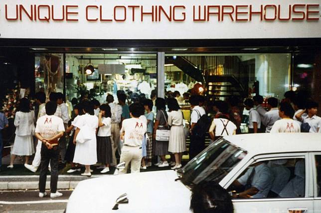 Crowds gather for the opening of the first Unique Clothing Warehouse, now known as Uniqlo, on June 2, 1984, in Hiroshima, Japan. A lot has changed since then for the Japanese retailer, whose roots go back to 1949. Photo: Uniqlo
