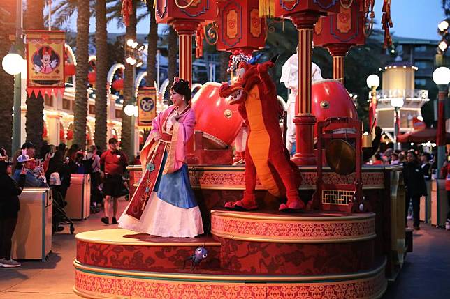 Performers dressed as Mulan and Mushu perform during a Lunar New Year celebration at Disney California Adventure Park in Anaheim, California, the United States, Jan. 17, 2025. (Photo by Qiu Chen/Xinhua)