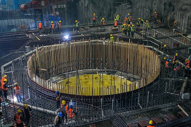 Workers operate at the construction site of Yebatan Hydropower Station in southwest China, Nov. 5, 2024. (Xinhua/Shen Bohan)