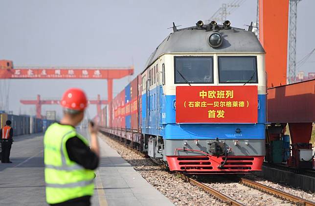 This photo taken on March 21, 2024 shows a China-Europe freight train bound for Belgrade, the capital of Serbia, departs from the Shijiazhuang international land port in north China's Hebei Province. (Photo by Zhang Xiaofeng/Xinhua)