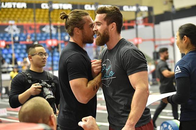 Adam Davidson (right) shakes hands with Khan Porter at the Pandaland CrossFit Challenge in Chengdu. Photo: Pandaland CrossFit Challenge