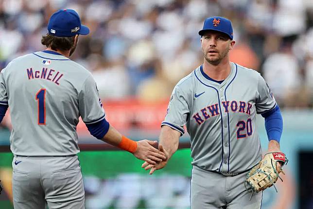 大都會當家重砲「北極熊」阿隆索（Pete Alonso，右）。法新社