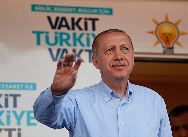 Turkish President Tayyip Erdogan attends a rally in Mardin