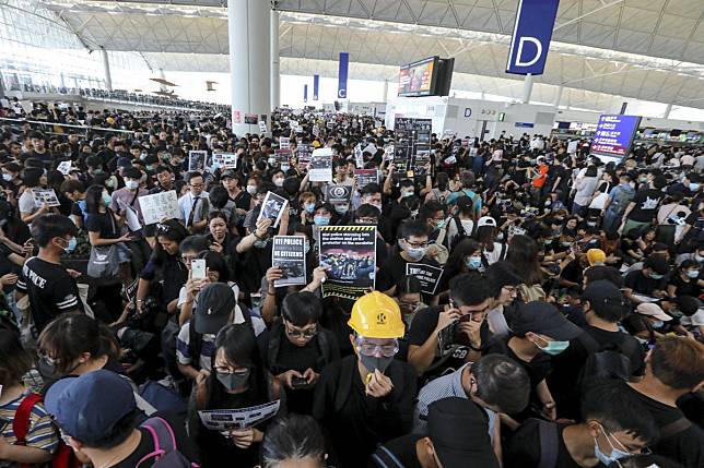 Thousands of demonstrators overwhelm the Hong Kong International Airport on August 12, 2019. Cathay Pacific found itself sucked into protest fallout. Photo: Felix Wong