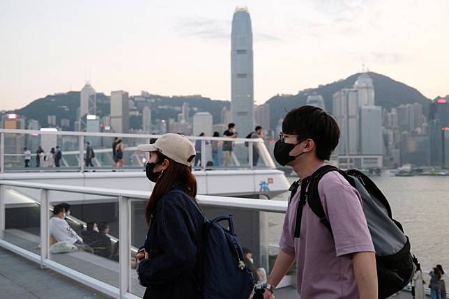People with protective masks in Hong Kong on March 23. Photo: Reuters