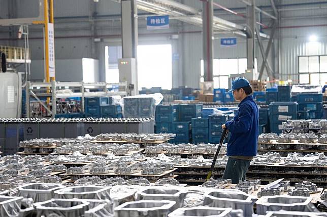 A man works at Changsha Boda Technology Industry Co., Ltd, a manufacturer and supplier of automobile parts, in Liuyang City, central China's Hunan Province, April 9, 2024. (Xinhua/Chen Sihan)