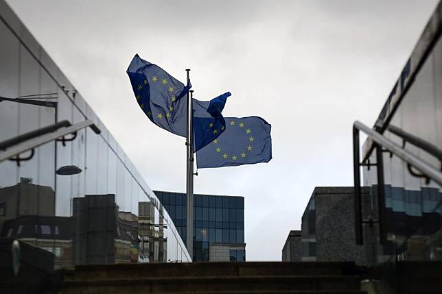 EU flags are seen outside the European Commission in Brussels, Belgium, Jan. 6, 2023. (Xinhua/Zheng Huansong)