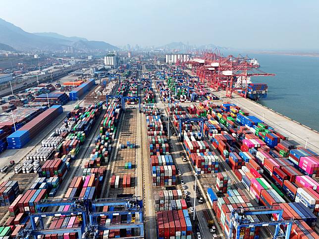 This aerial drone photo taken on Dec. 10, 2024 shows a container terminal of Lianyungang Port, east China's Jiangsu Province. (Photo by Wang Chun/Xinhua)