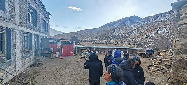 Local police officers check an earthquake-affected area in Qutang Village of Dingri in Xigaze, southwest China's Xizang Autonomous Region, Jan. 7, 2025.