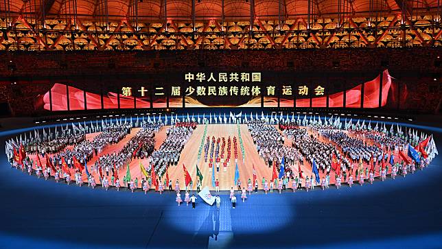 Representives of athletes and judges take an oath during the opening ceremony of the 12th National Traditional Games of Ethnic Minorities of the People's Republic of China in Sanya, south China's Hainan Province, Nov. 22, 2024. (Xinhua/Guo Cheng)