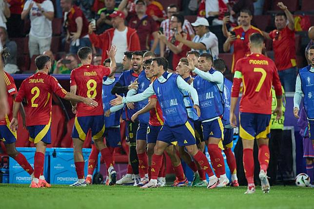 Players of Spain celebrate during the UEFA Euro 2024 round of 16 match between Spain and Georgia in Cologne, Germany on June 30, 2024. (Xinhua/Meng Dingbo)