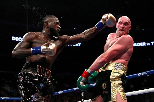 Deontay Wilder in action against Tyson Fury in their first WBC heavyweight title fight in Los Angeles in 2018. Photo: Reuters