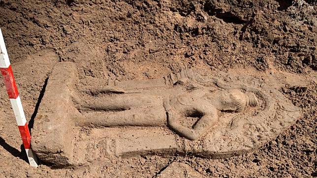 This undated photo shows a recently unearthed sandstone door guardian statue at the ancient Royal Palace of Angkor Thom in Siem Reap province, Cambodia. (ANA/Handout via Xinhua)