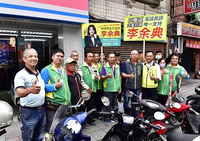 民進黨新北第三選區（三重區）立委初選參選人李余典今由崇德社區發展協會理事長及全體幹部陪同，到龍門市場拜票。 圖：李余典服務處提供