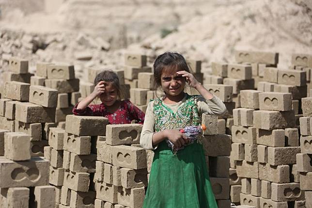 Children work at a brick kiln factory on the outskirts of Deh Sabz district, capital Kabul, Afghanistan on Sept 28, 2024. (Photo by Saifurahman Safi/Xinhua)