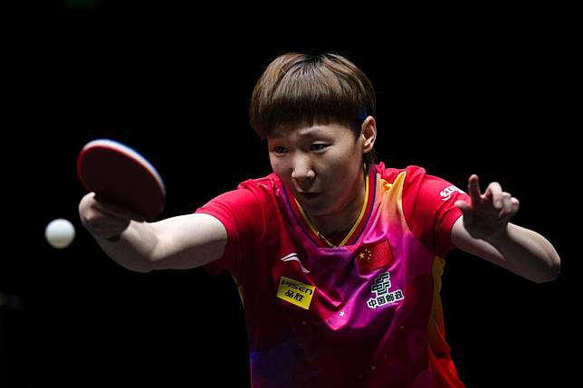 Wang Manyu of China hits a return during the women's singles first round match against Shi Xunyao of China at the 2024 World Table Tennis (WTT) China Smash in Beijing, China, Sept. 30, 2024. (Xinhua/Xiao Yijiu)