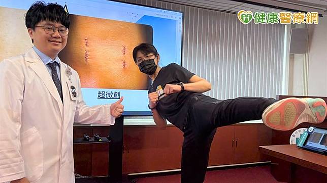 臺中榮總神經外科醫師李政穎(左)以超微創內視鏡脊椎融合手術，成功治療跆拳道教。