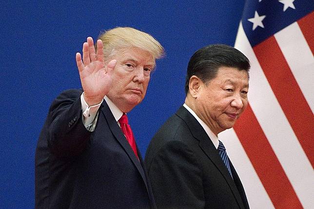 China and the US are still working on the details of an interim trade deal to end their trade war. Photo: AFP