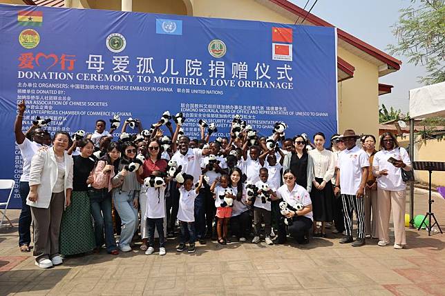 People pose for a group photo at the Motherly Love Orphanage in Accra, Ghana on Dec.21, 2024. (Xinhua/Seth)