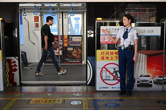 A staff member works at a monorail train station in Wuhu City, east China's Anhui Province, Sept. 18, 2023. (Xinhua/Zhou Mu)