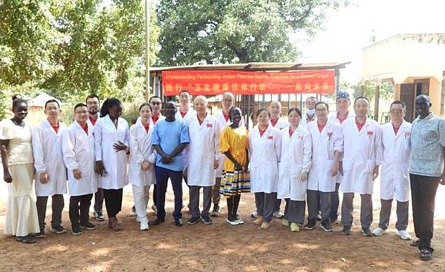 Chinese doctors pose for a group photo with their South Sudan counterparts in Yapa Village in Central Equatoria State, South Sudan, on Dec. 2, 2024. (Photo by Denis Elamu/Xinhua)