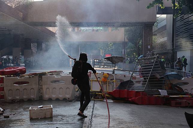 Tear gas is fired in Tuen Mun. Photo: Sam Tsang